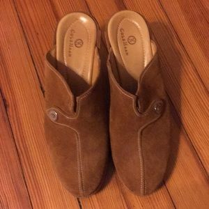 Brown Cole Haan mules size 9.5. Never worn.